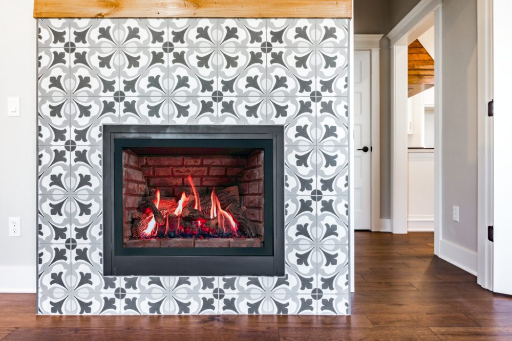image of a gray spanish tile fireplace